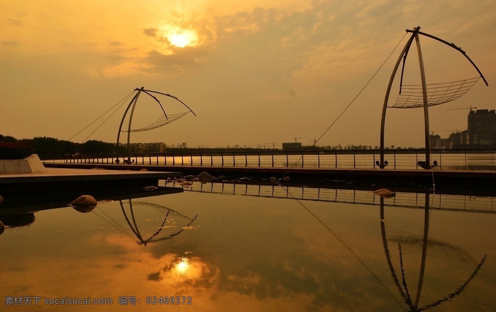 龙池黄昏 龙池湖 黄昏 倒影 湖面 湖水 夕阳景观 鱼网 撒网 自然风景 自然景观